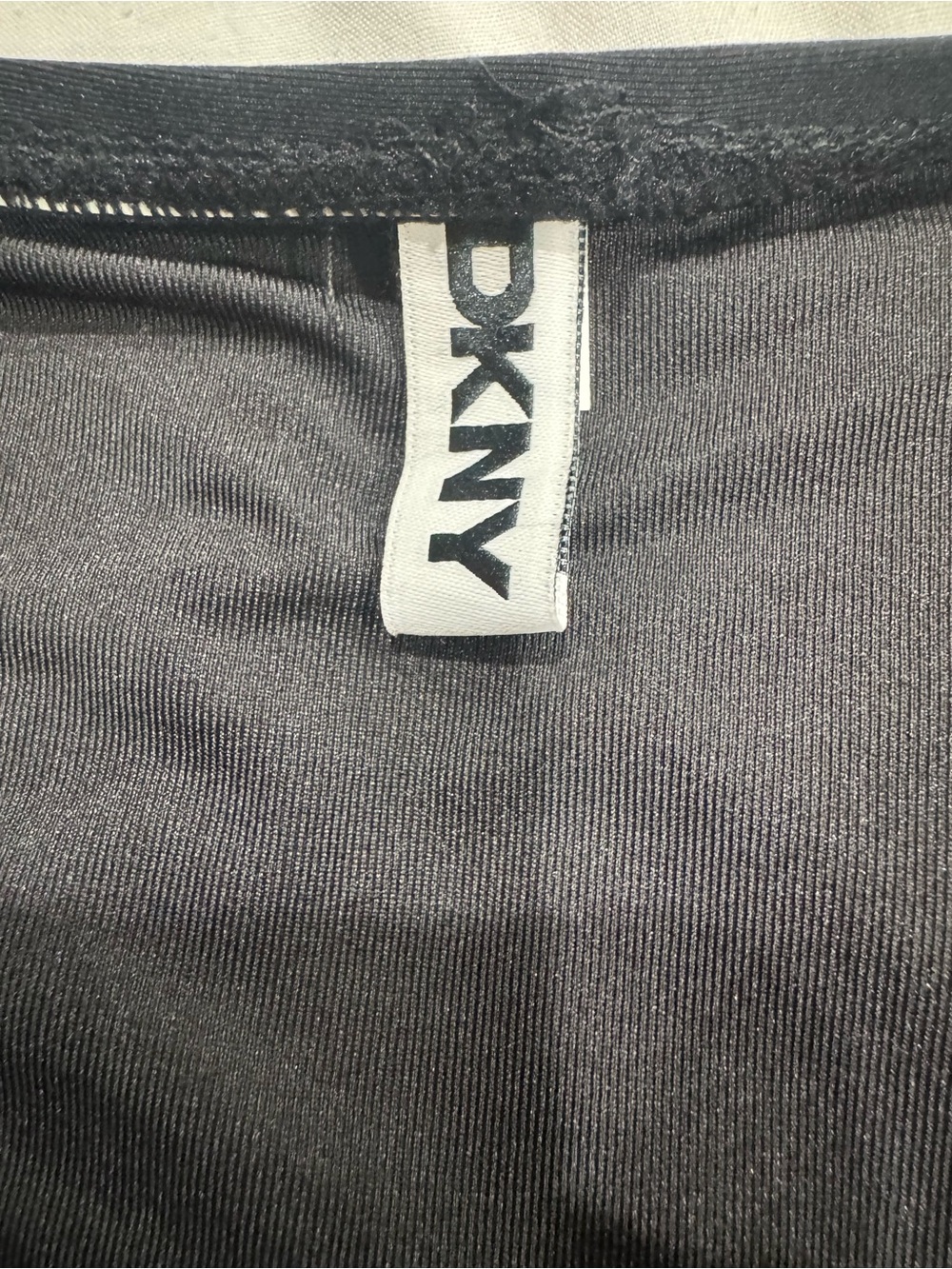 NWT- DKNY Black One-Piece Swimsuit with Ring Strap Detail. - Picture 10 of 16